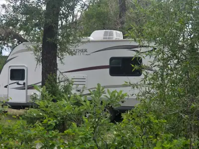 21 feet and with the slide is out it's 26 feet. Tows with ease, stabilizing hitch and sway bars incl...