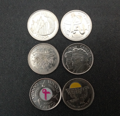 Canadian 25 cent coins for collection, fine condition.