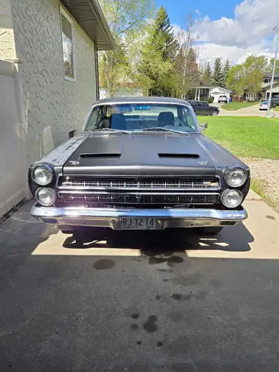 1966 comet caliente insured and registered in Alberta. 289 2 barrel automatic. Has a 67 cyclone hood...