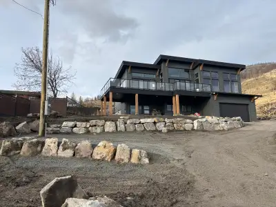 Brand new Beautiful walkout with gorgeous view of Lake Okanagan. Large covered concrete patio. Only...