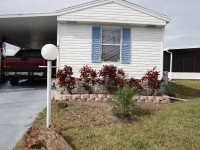 Great 2 bedroom home 30 minutes south of Tampa. Gated community. Laundry included. Pool and hottub....