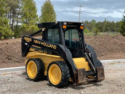 New Holland Lx885 Turbo Skid Steer Hand & Foot Controls Great Condition 8750 hrs Year is between 199...