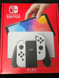Nintendo Switch OLED + games/controller 