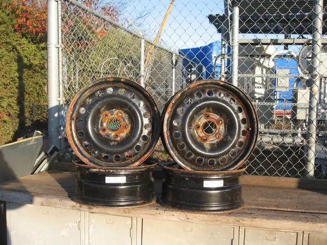 4 STEEL CAR RIMS - in NEWCASTLE in Tires & Rims in Oshawa / Durham Region - Image 2