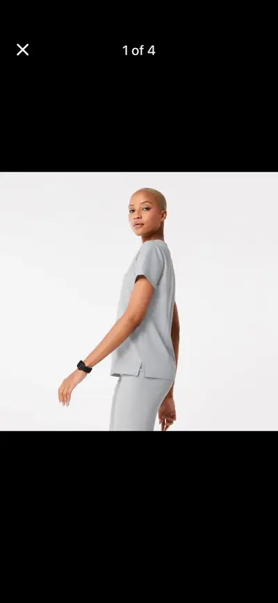 like new figs silver scrub set size XS one pocket top an jogger style bottoms only wore a few times,...