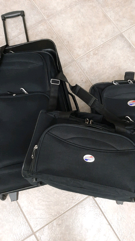 LUGGAGE SET - $80 TOTAL *4-PIECE AMERICAN TOURISTER* in Garage Sales in Windsor Region - Image 3