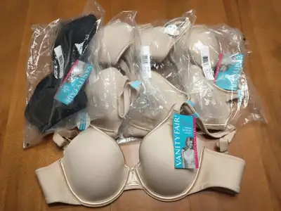 $12 each. Brand new Vanity Fair Body Caress underwire bras. 2-way convertible straps. Tags still att...