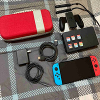 Nintendo Switch OLED + games & accessories