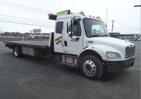 Frighliner m2 flat bed tow truck 