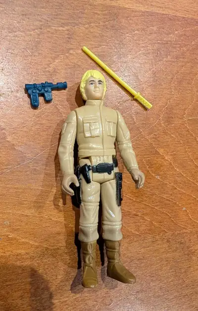 Mint condition Blonde version with authentic blaster and yellow lightsaber. No repro. Stored since c...