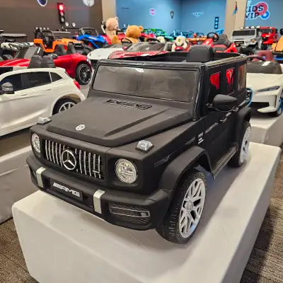 The Mercedes G63 features an eco-leather seat, rubber wheels, remote control for parents, USB and Bl...