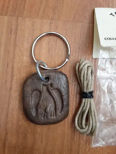 Totem wood carved   Hawk keyring, View more