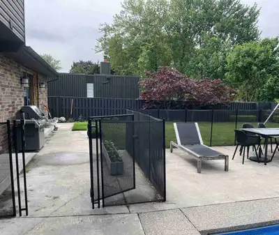 This is a mesh pool fence designed to provide safety and peace of mind around your pool area. This u...