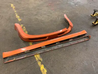 Rear bumper valence and both side skirts