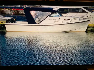 Located in St John's, NL. 2007 SeaRunner 270 (27'L X 9'4"W) with twin 2008 Mercury optimax 115 engin...