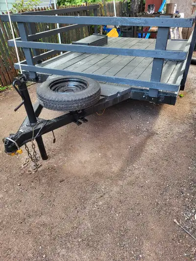 Flatdeck Utility Trailer. 106" by 76" deck size. Width between fenders is 47.5"". Can drive over fen...