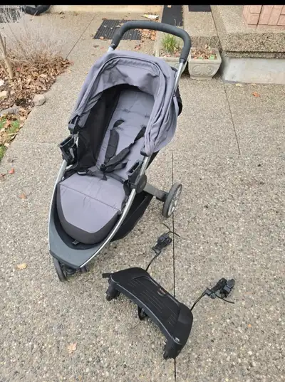 Lightweight stroller, easy to fold. Includes an infant car seat adapter and Kid stand board. Grey an...