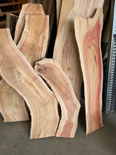 I have several pieces of blood maple lumber, perfect for woodworking projects with their unique red...