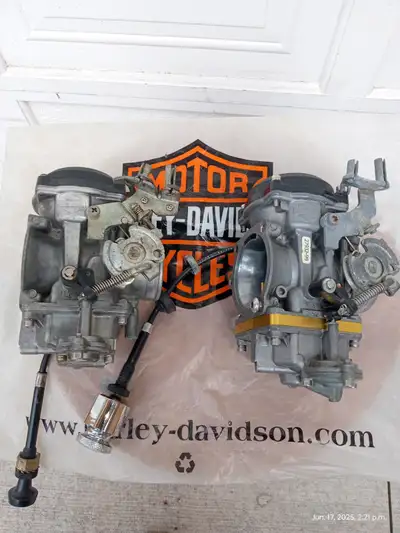 Stock HD carburators $75 each. Thunder High Flow Intakes $75 each High Flow Intake $75 New (never in...