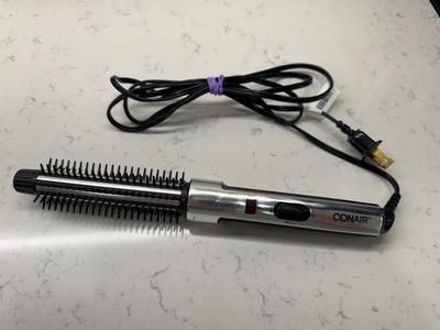 Conair curling iron (brush curling iron). With high and low settings. In great condition, like new,...