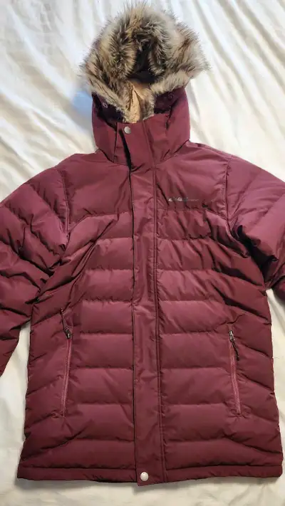 This is an Eddie Bauer men's winter down coat, perfect for braving the cold in style. This coat has...
