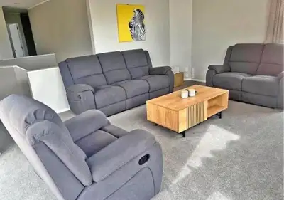Three-piece grey fabric recliner set.  FREE DELIVERY IN GTA, View more