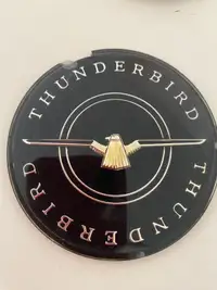 N.O.S. New old stock Thunderbird centre emblems 