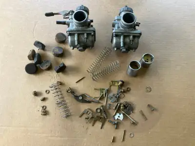 Garage clearout I believe these to be misc carb parts from a Yamaha DS7. The carbs are stamped 280 A...
