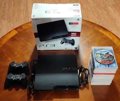 Sony Playstation 3, 160 GB, with 17 games, 2 controllers. $240.