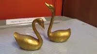 Vintage brass swans figurines.