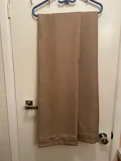 Brand new. 80 inches wide by 54 inches long. Two panels. Machine wash and dry. 100% polyester. Beige...