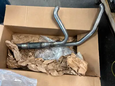 Brand new high flow head pipe with cat. Came with 135ci motor but never used.