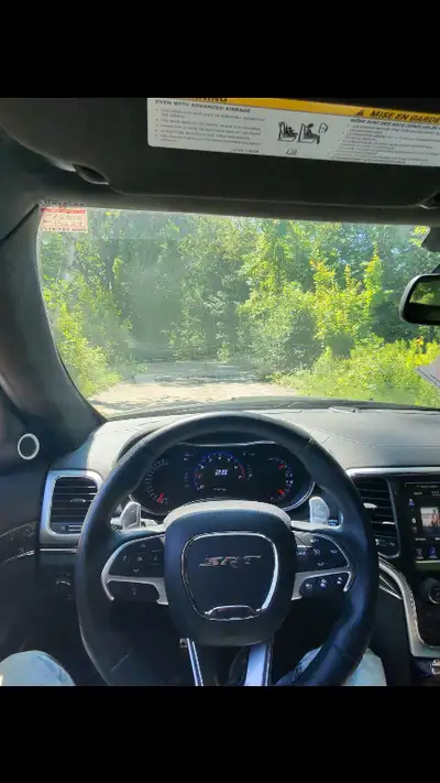 I have a bunch of OEM SRT jeep parts that were removed from my Jeep. Including, OEM Steering wheel a...