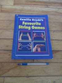 STRING GAMES SOFTCOVER BOOK. KELLIGREWS FOR PICK UP.