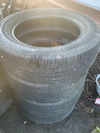 205/60R16 Bridgestone tires. Little bit of weathering. Still lots of tread and even wear. Want gone....