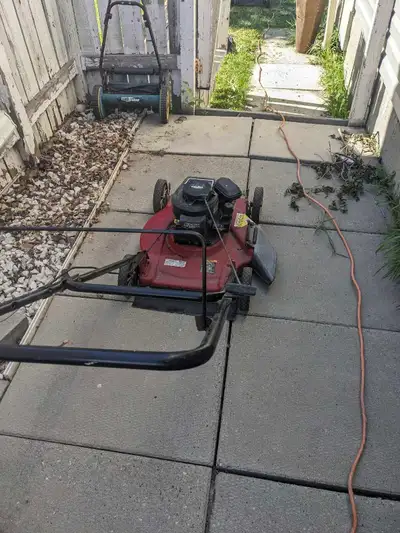 Lawn mower with no bag ,runs and is ready to go .