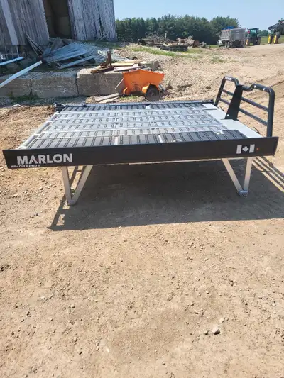 Sled deck. Used twice. Like new condition. Fits two sled or two quads. Fits in bed of 6'6" truck box...