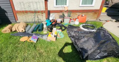 All For $60 2 Giant Garbage Bags 3 Jerry Cans Large Has Premium Fuel 2 x 5lb Propane Tanks Rolls Of...
