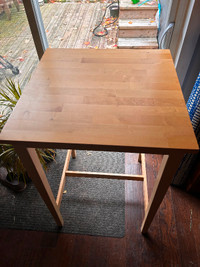 Pub table with two stools