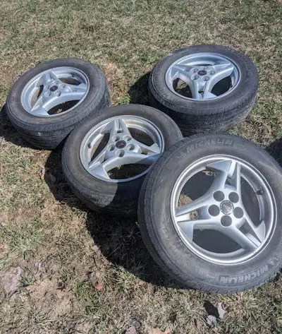 15 inch Tires & Aluminum Rims fit Sunfire or Cavalier Asking Price $150.00