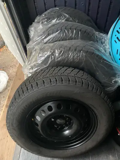 Like New winter tires- Bridgestone Blizzak winter tires 225/65R17- used less than 1 season DOT F50DB...