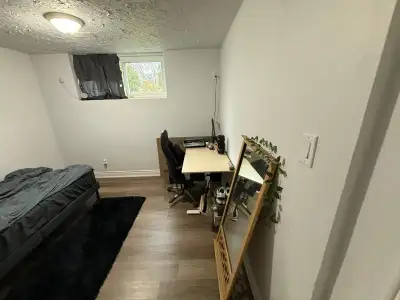 A private room available in a basement . Walking distance from Conestoga college . Parking is availa...