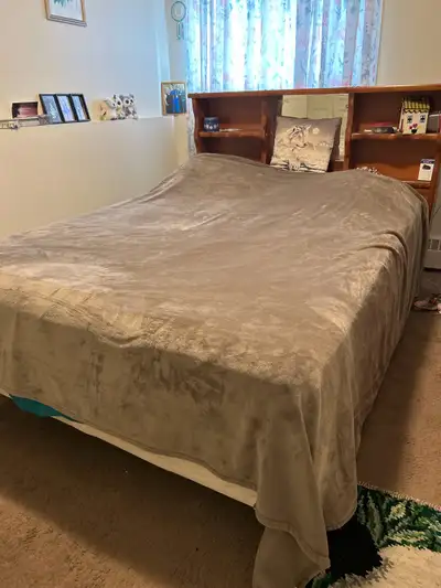 Queen size bed, mattress,box spring and headboard with shelves.