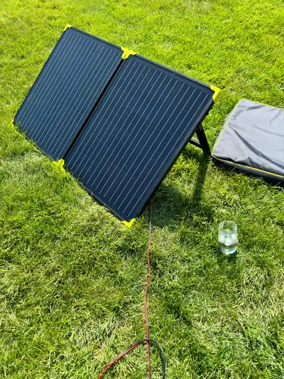 Portable suitcase style 100watt solar panel kit , closed dimensions 20 1/2” x26 3/4”, opened dimensi...