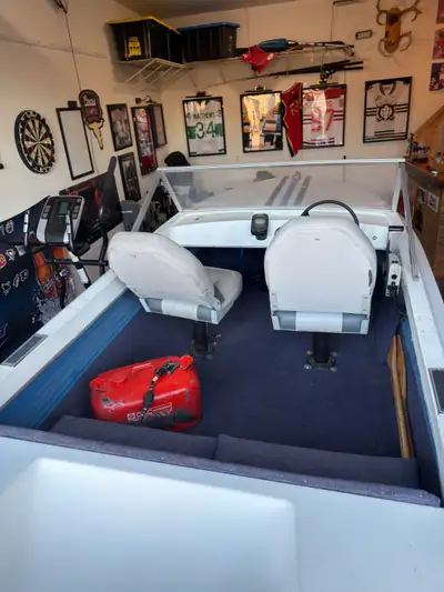 *My Loss Your Gain* Running 65 HP Evinrude Boat and Trailer. Boat is ready for the water, comes with...