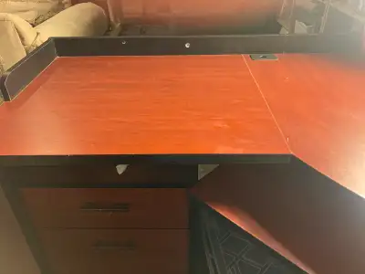 Corner desk unit with an under desktop filing cabinet, drawer and shelf, laptop and monitor tray. Pa...