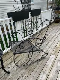 Heavy Cast iron rocking chair with cushion 