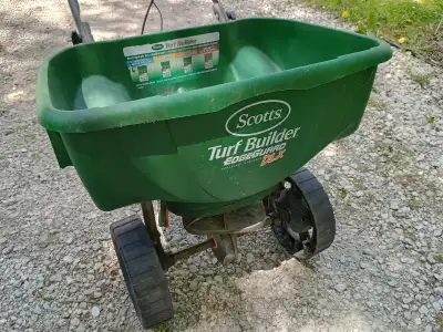 Scott's Turf Builder DLX with Edge Guard. Good condition. Works well. Cash sale. Pick up.