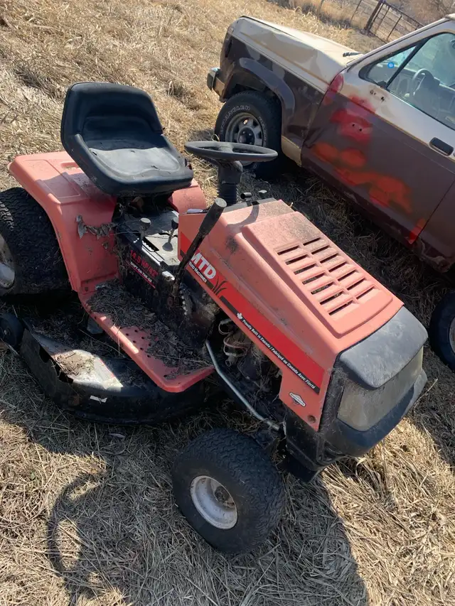JD 165 lawn tractor and other parts tractors62866661289985123