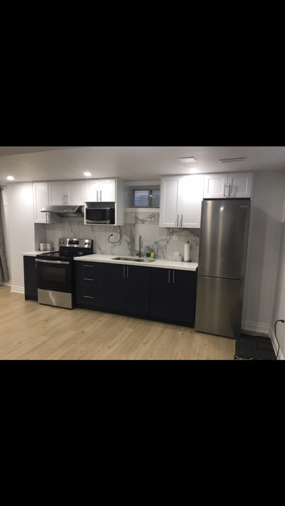 $1300/month. New, natural light, separate entrance, open concept, includes 1 car parking, wifi, cabl...